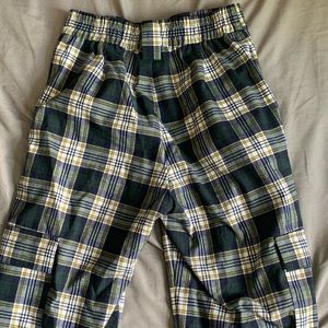 dark green, white, & yellow slacks